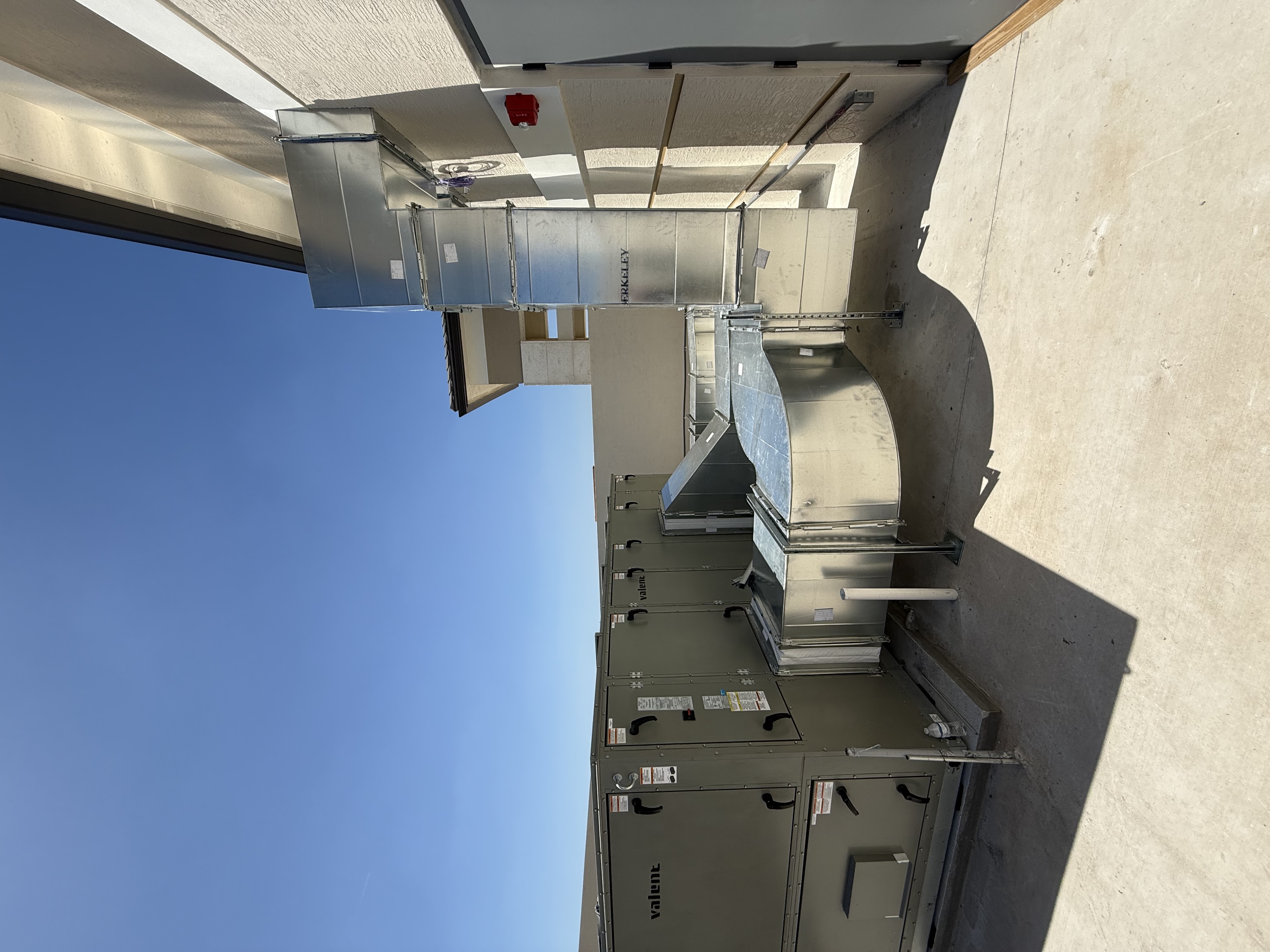 Air handling units and welded ductwork riser at an outpatient surgical center